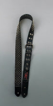 Load image into Gallery viewer,  Designed for the guitarist who thrives on intensity, this strap is crafted from premium, full-grain leather and adorned with bold metal rivets, creating a look that’s both rugged and stylish. Its robust construction ensures long-lasting durability, while the adjustable length ( 50"- 61")and premium quality leather provide unparalleled comfort during extended performances.