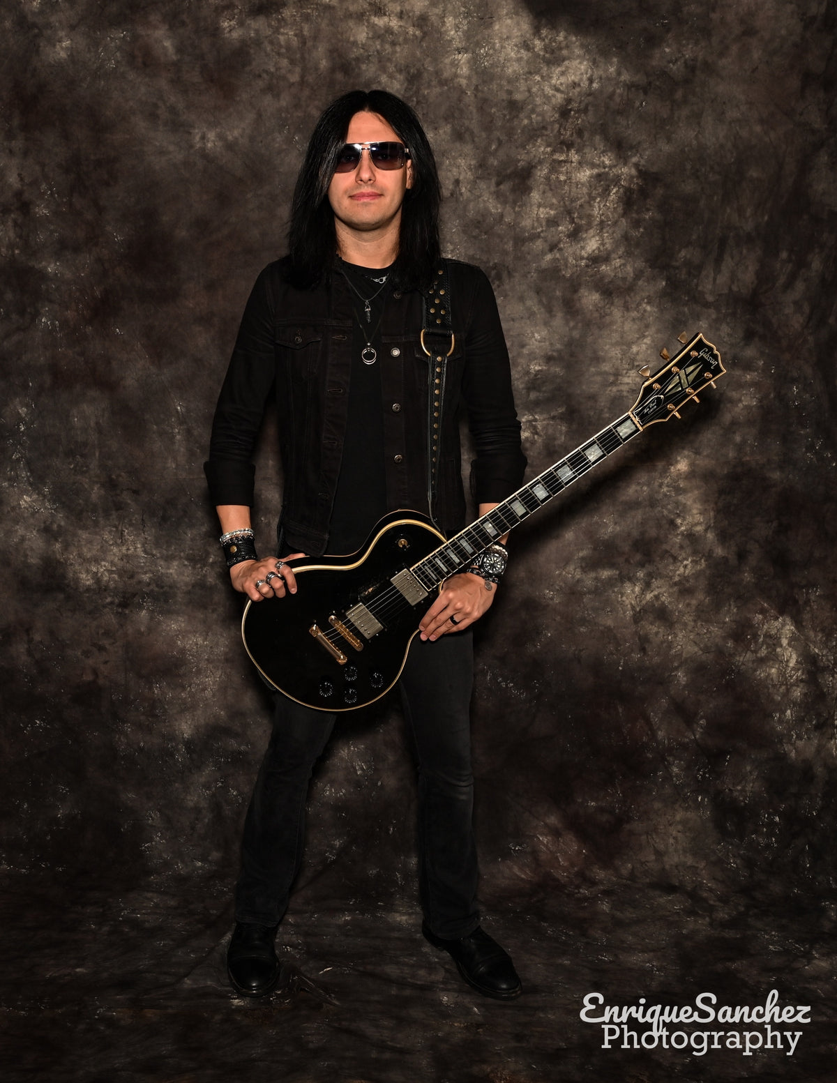 The Swashbuckler Original antique brass on black Guitar Strap by Al Bane for Leather - front stage view