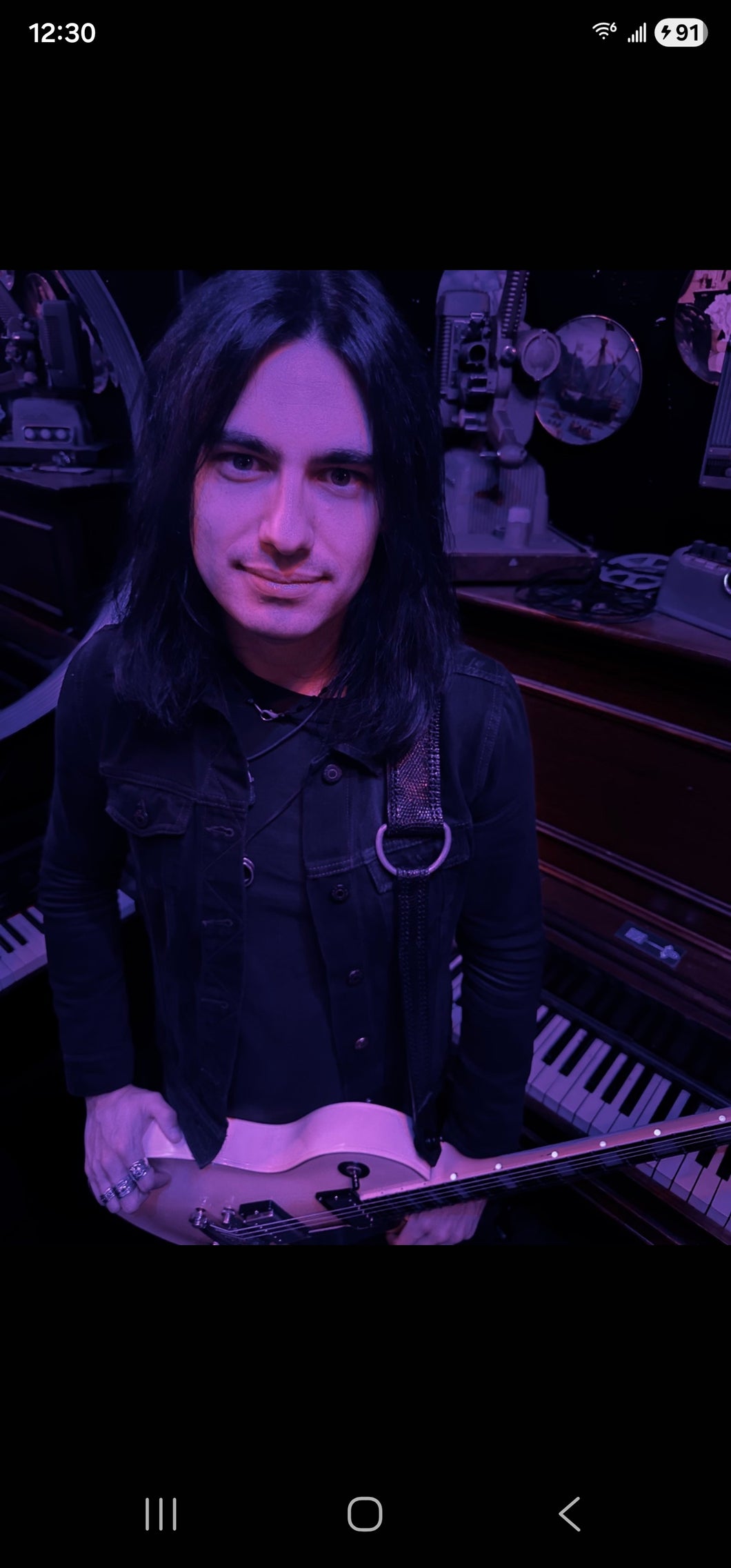 Swashbuckler Black Lizard on black leather with antique nickel hardware